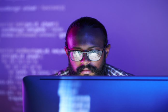 Top 10 Developer Blog posts of 2019 Programmer in front of monitor